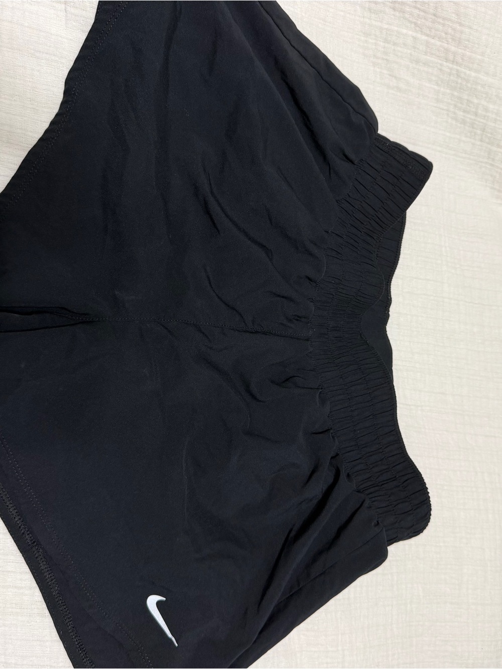 Nike Black Women’s Athletic Shorts with White Swoosh